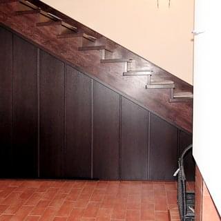 A beautiful solution for the space under the stairs